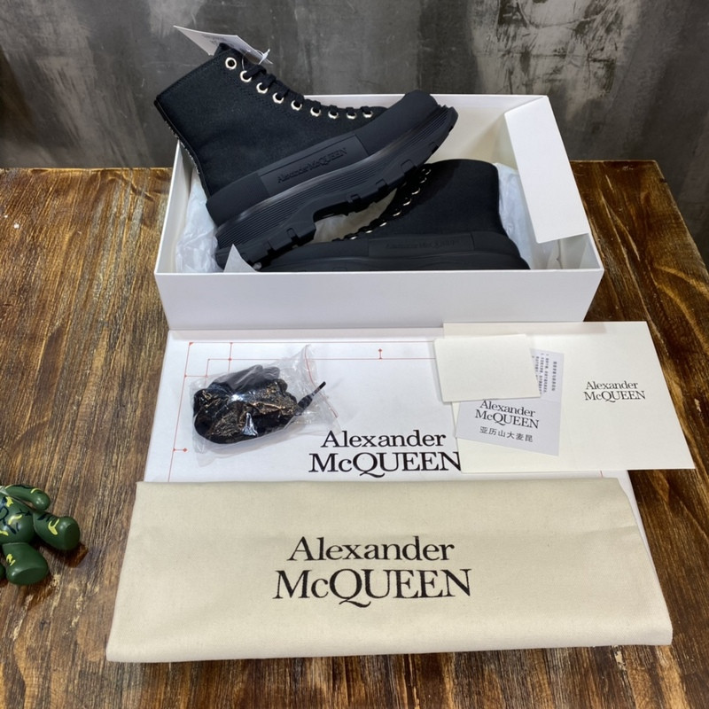 alex mcq tread slick boot in black