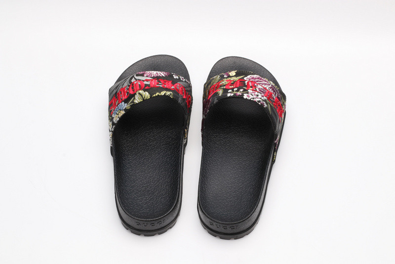 G*u*i slides all black with flower