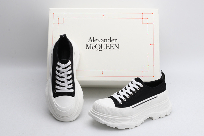 alex mcq tread slick lace up in black
